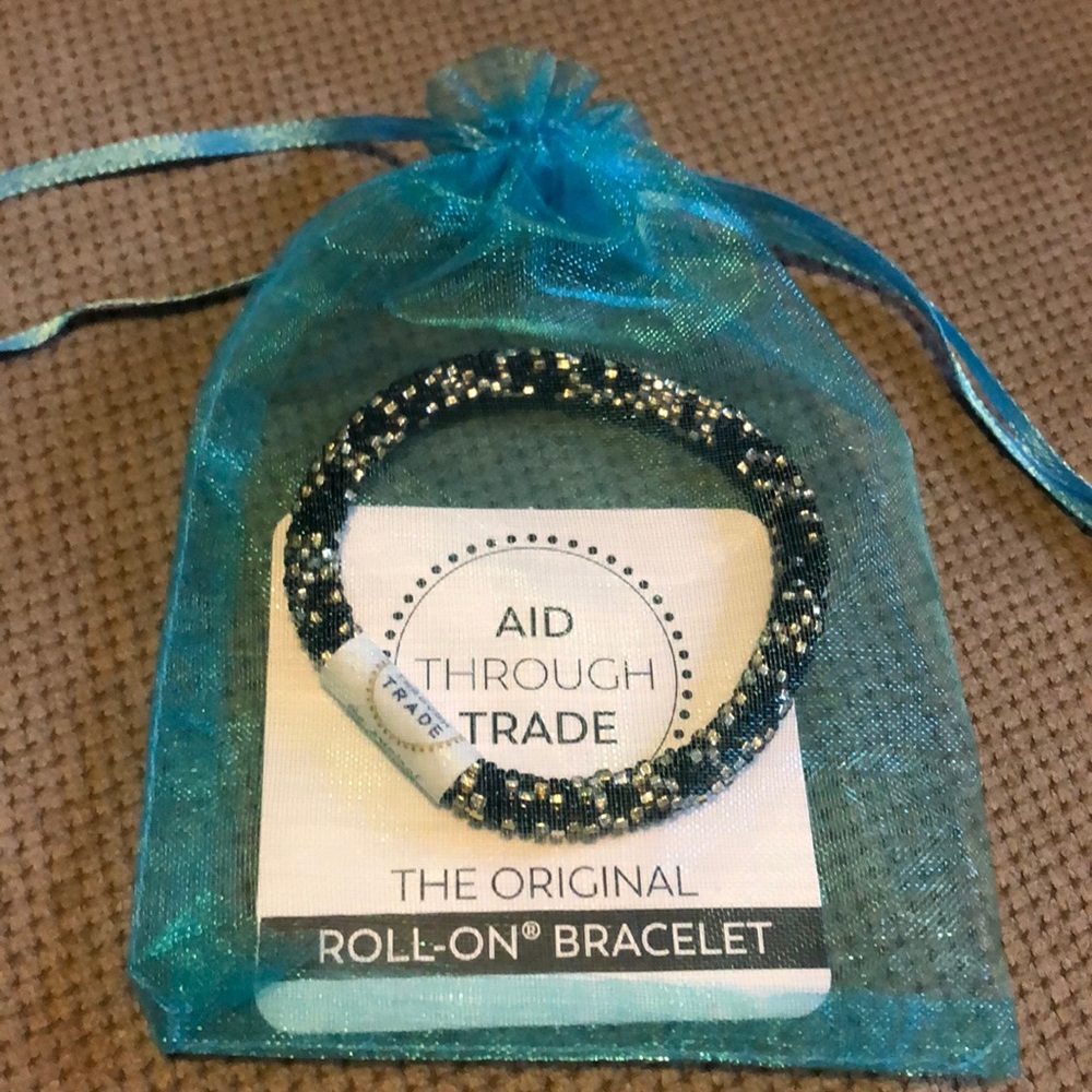 NWT Aid Through Trade Original Roll-On Bracelet